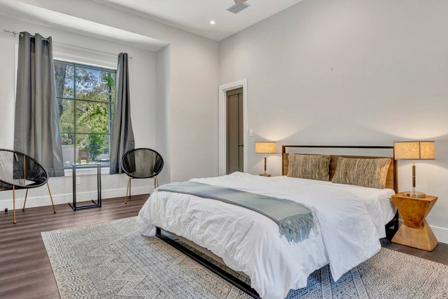 The spacious private casita has its own bathroom, seating area, and view of the pool.